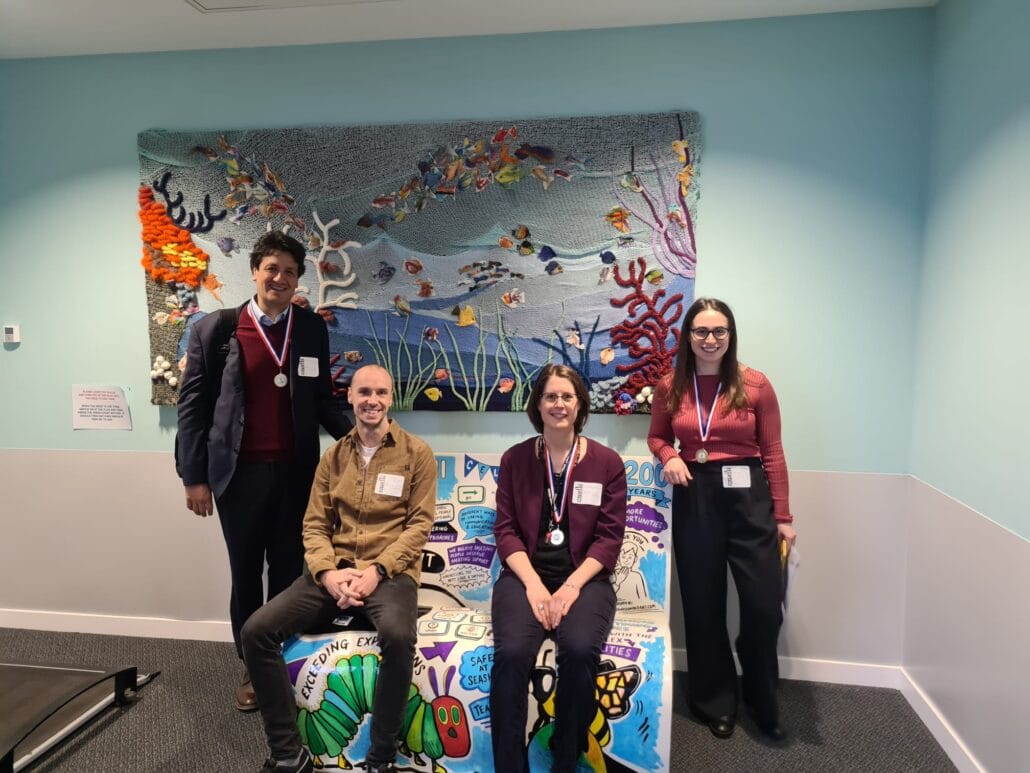 Group photo of Alfredo, Damien, Lindsey and Sydni